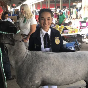 My god daughter/ niece with her "natural" wether lamb! She sold for 1500!