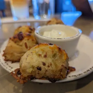 Lagniappe - yummy green chile cheddar biscuits with whipped butter