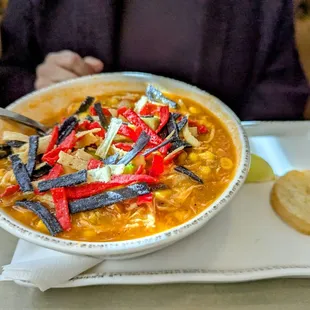 LARGE bowl of nontraditional but good green chile chicken stew for a reasonable price