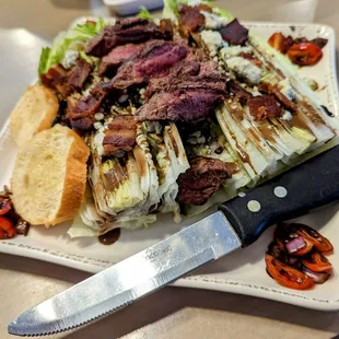 Enormous, delicious steak salad with bleu and bacon