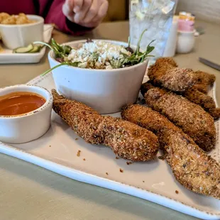 Chicken strips, quinoa salad