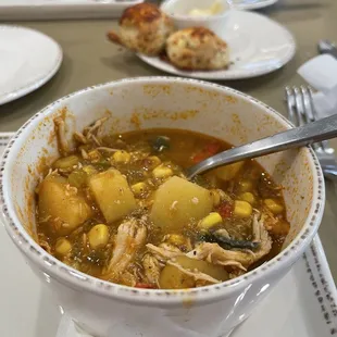 Green chile chicken stew. Really good, i would take a quart home. In the back is the green chile biscuits?