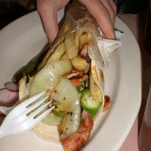 Placero - meat, onions, rice and fries. Epic taco.
