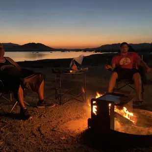 My  boyfriend and his father relaxing by the fire