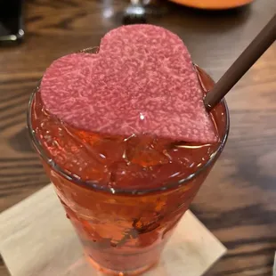 a heart shaped ice cream in a glass