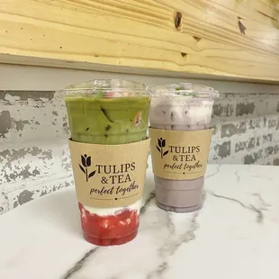 iced strawberry matcha milk tea + taro milk tea