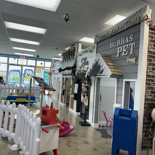 Construction site, diner, market, salon, pet rescue, post office, play areas for the kids.