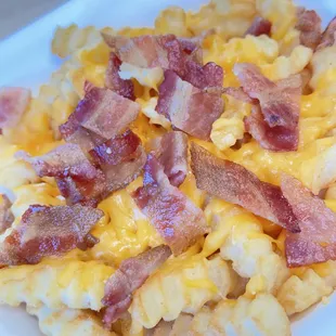 Bacon cheddar cheese fries
Real cheese (not nacho fake cheese)