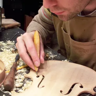 Trained luthier Jacob Mehlhouse, owner of Tulsa Strings