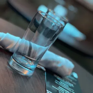 a glass of water on a table