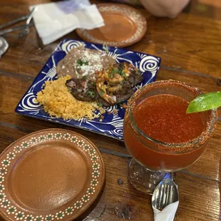 Ribeye Steak, rice and beans with a Michelada!