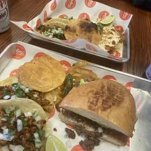 Box combo (2 tacos+1/2 Quesadilla) and Tully&apos;s Combo (2 tacos +1/2 Torta)...and a drink