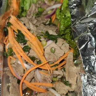 What ordered vs what I got.... beef salad got pork salad