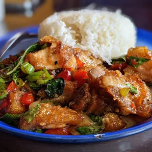 T13. Pad-Kra-Pow Moo-Grop. $15. Stir-fried crispy pork in basil sauce served with jasmine rice.