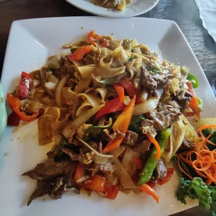 Egg roll, Chicken wings, Tom Kha Gai, Pad Thai,  Pad Kee Mow, Green Curry.