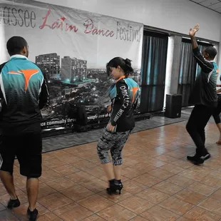Tumbao instructors teaching a workshop at the Tallahassee Latin Dance Festival