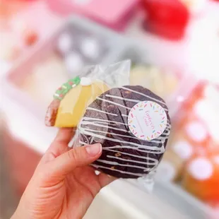 a person holding a donut