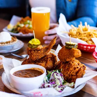 a table full of fried food and drinks