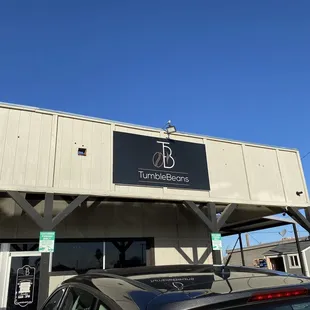 a car parked outside of a building