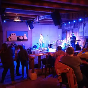 a band playing on stage