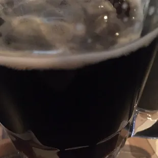 a closeup of a glass of beer
