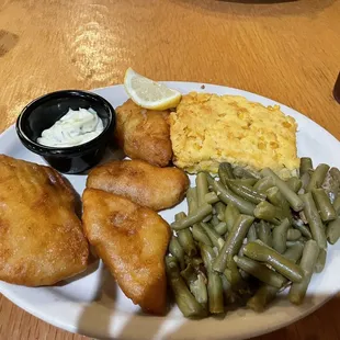 Fried cod with scalloped corn and green beans