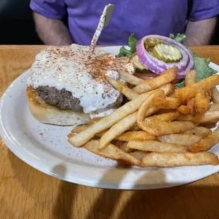 Blackened blue cheese burger and fries.
