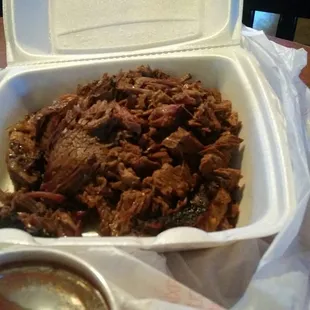 pulled pork in a styrofoam container