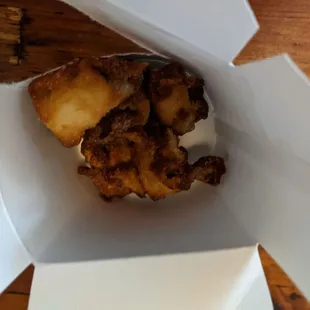 fried food in a white box