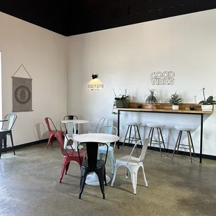 a room with tables and chairs