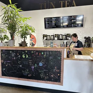 a woman sitting at a counter