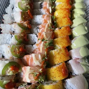 L-R: Spicy Hamachi Roll, Lemon Grove Roll, Spicy Mango Roll, and Avatar Roll