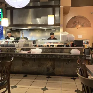 the kitchen of a japanese restaurant