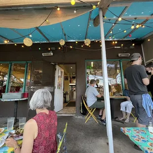 a group of people eating outside