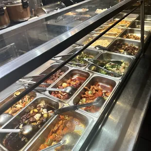 a buffet with many different types of food