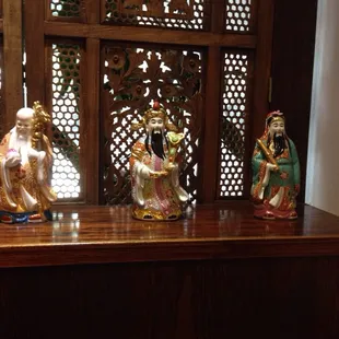 a group of asian figurines