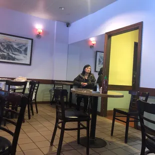 a woman sitting at a table