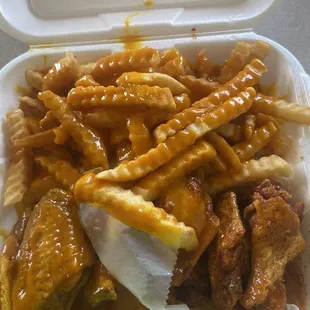 10 piece wing combo. Tangy sauce on wings and fries