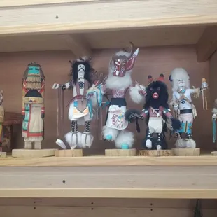 a collection of native figurines