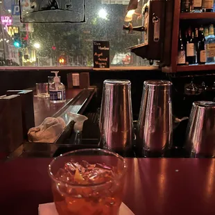 a drink in a glass on a table