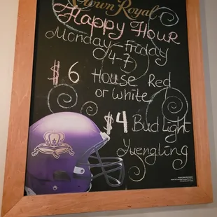 a chalkboard with a football helmet on it