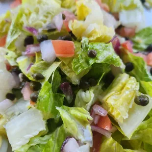 They dice the tomato and onion so tiny for the salmon plate. Probably to preserve product