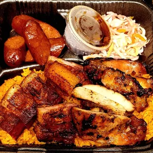 Gadao Plate - BBQ Chicken, Pork Belly, Hot Link Sausage, Red Rice, Finadene, and pickled slaw.