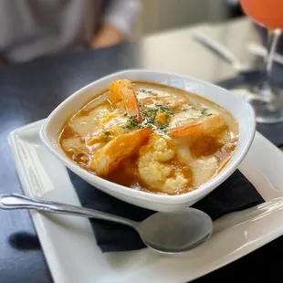 a bowl of soup on a plate