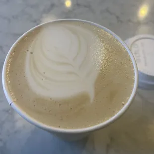 cappuccino w/ oat milk pour in