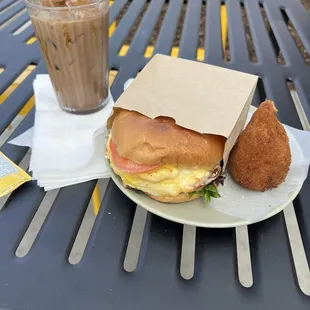 Moreno iced coffee and turkey and egg sandwich.