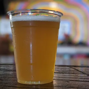 a glass of beer on a table