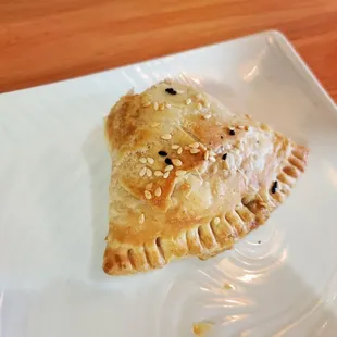 a piece of pie on a plate