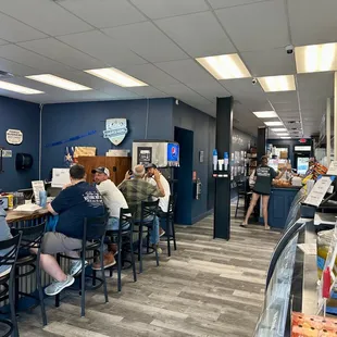 Plenty of seating inside and at the bar which serves local craft beer on tap.