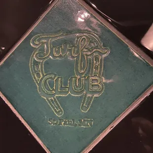 the logo on the tile